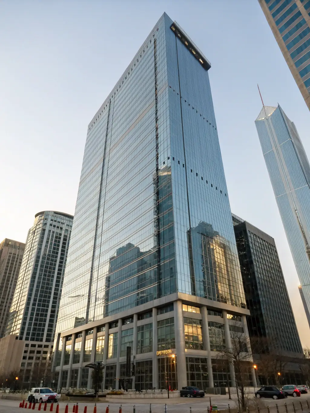 A sophisticated, modern office building spanning multiple floors, representing ARH Global Advisors' presence in key states like New York, California, and Texas. The image should convey stability and expertise.