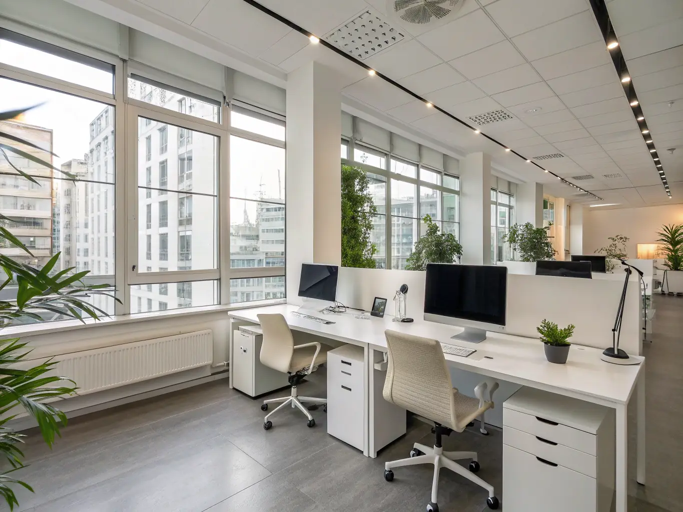 An image of a well-organized office space with digital displays showing workflow optimization charts, representing efficiency and streamlined operations.